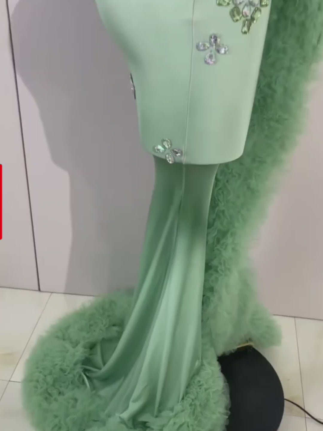 product video of mint color even tulle gown