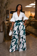 Floral Waist Belt Jumpsuit with Deep V-Neckline